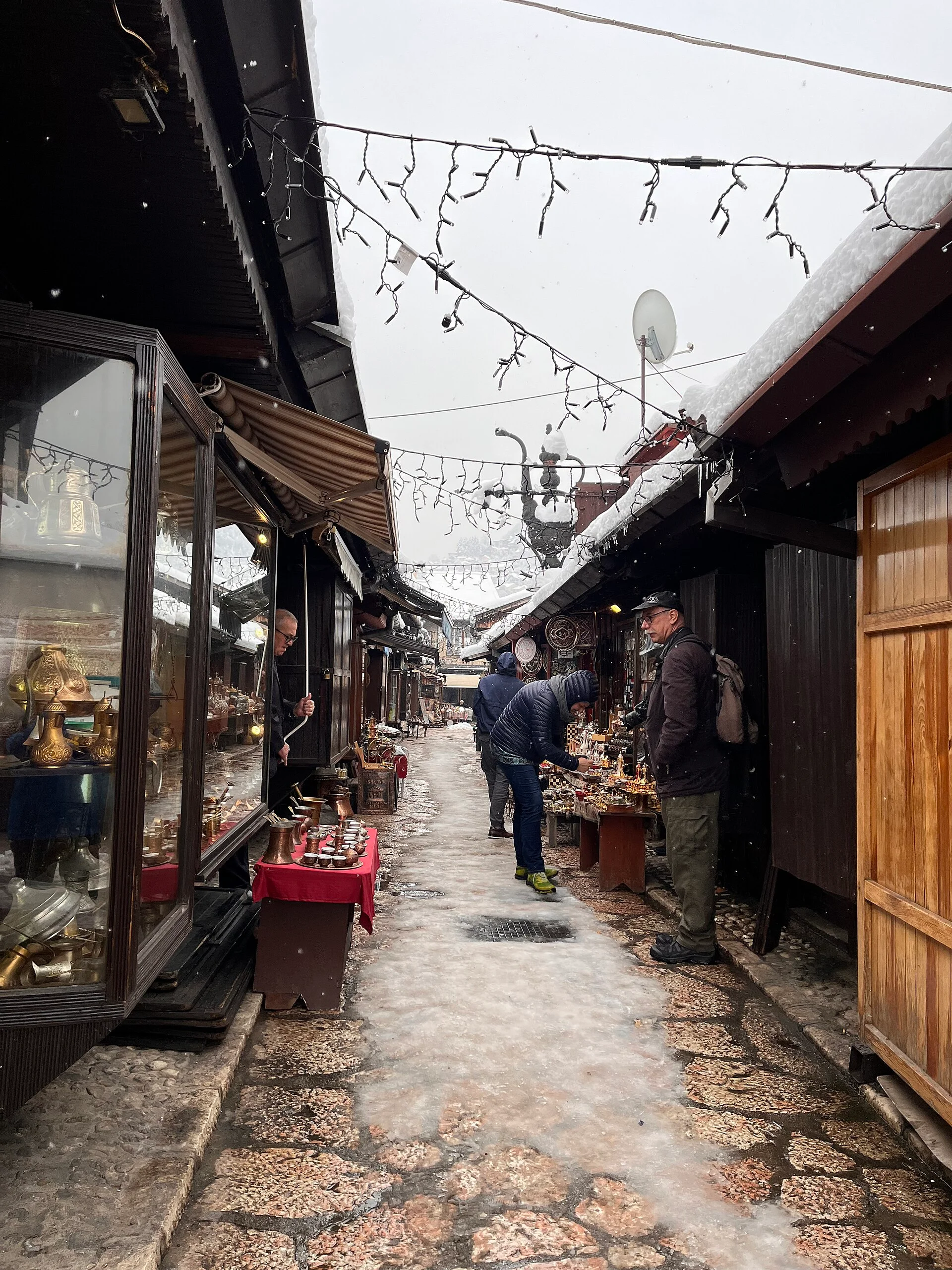 Copperware hangs outside workshops along Kazandžiluk in Sarajevo.