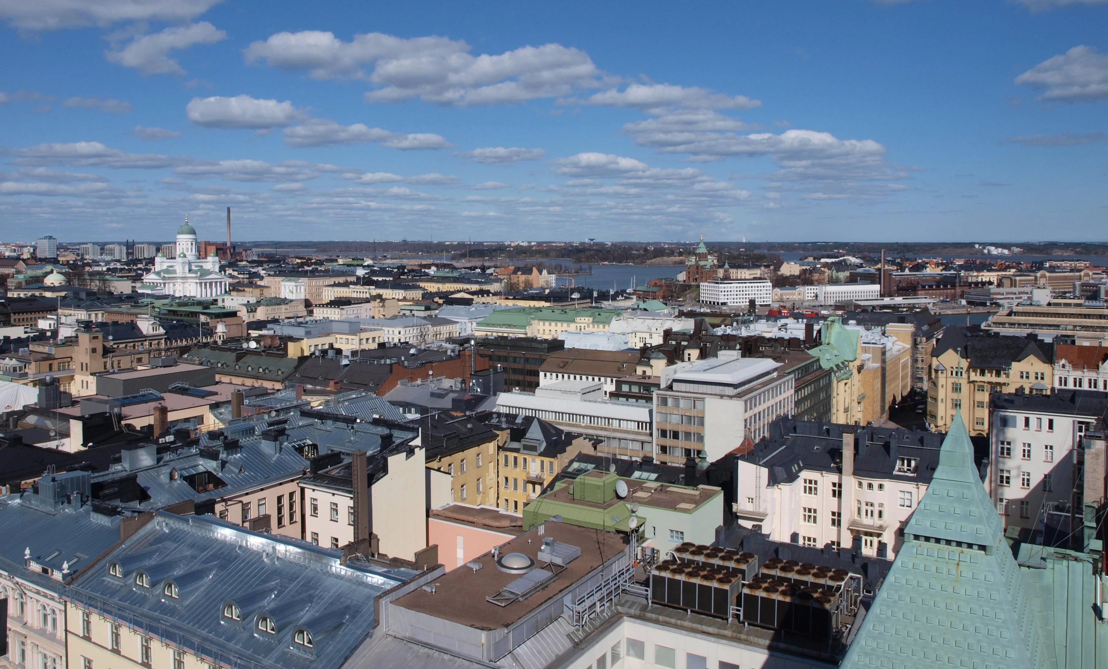 Morning light reaches Helsinki harbour and the city beyond.