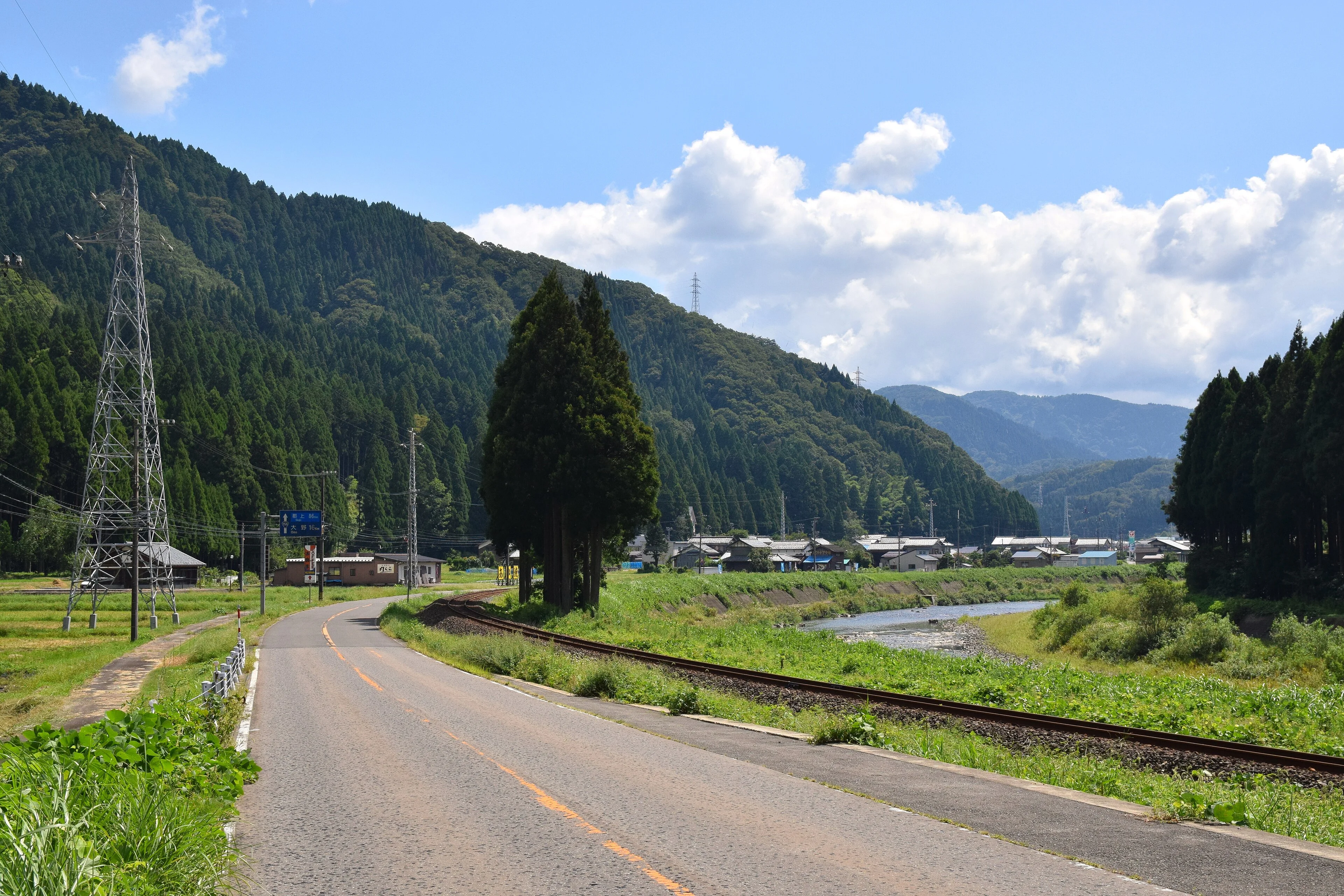 September fields and low hills stretch across the countryside in Fukui Prefecture.