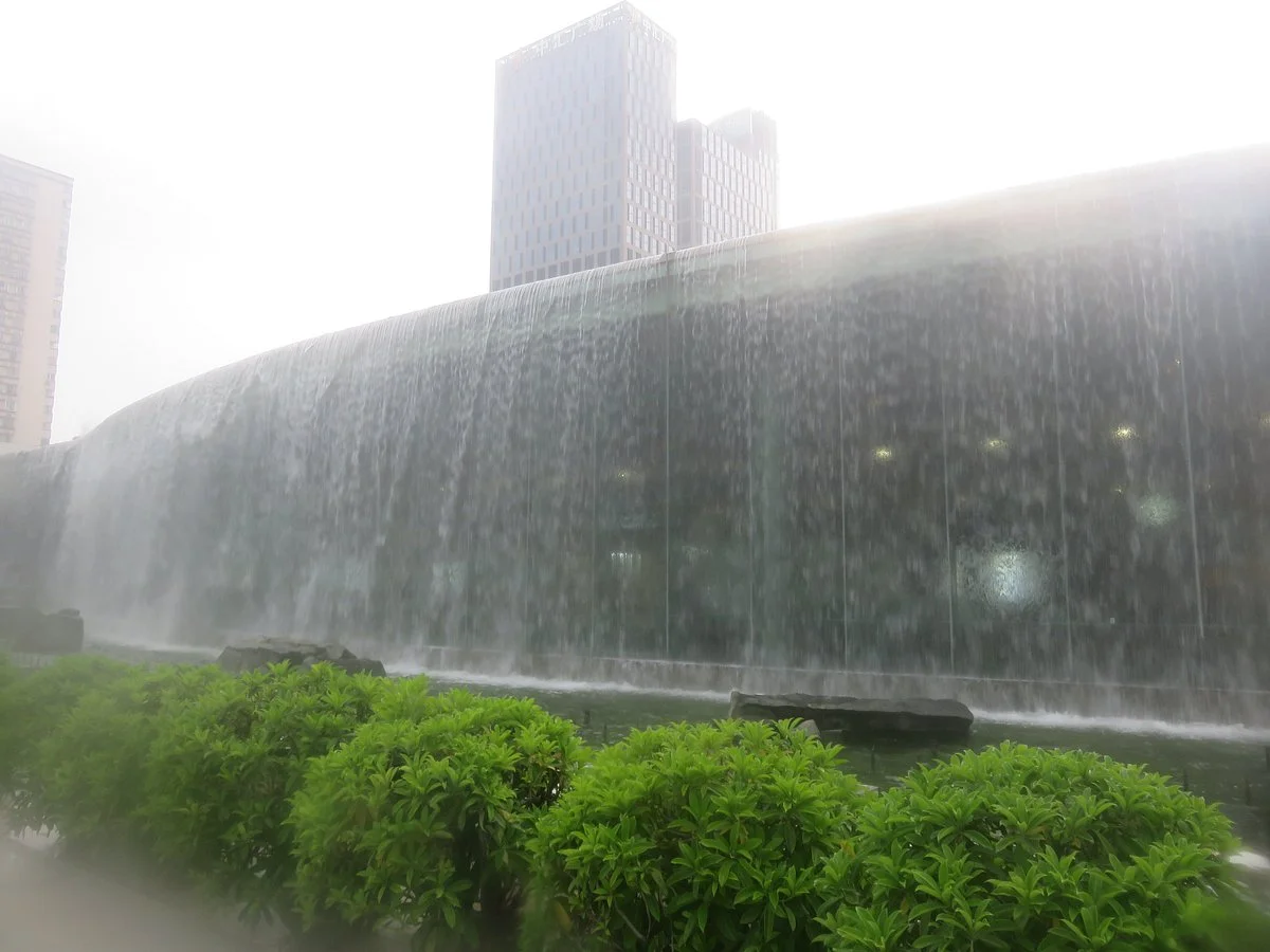 Waterscape Falls In East Station Plaza