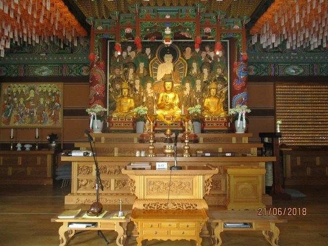 Rock-carved Standing Buddha
