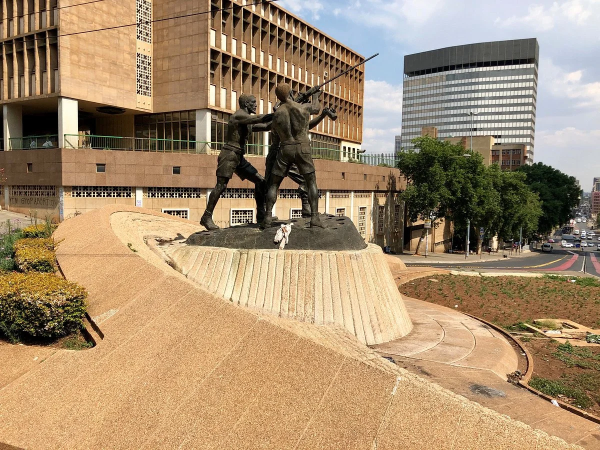 Gold Mining Statue